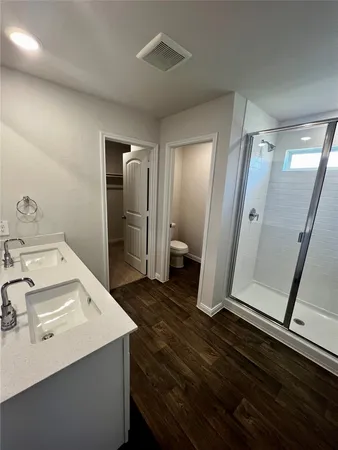 a bathroom with a sink and mirror