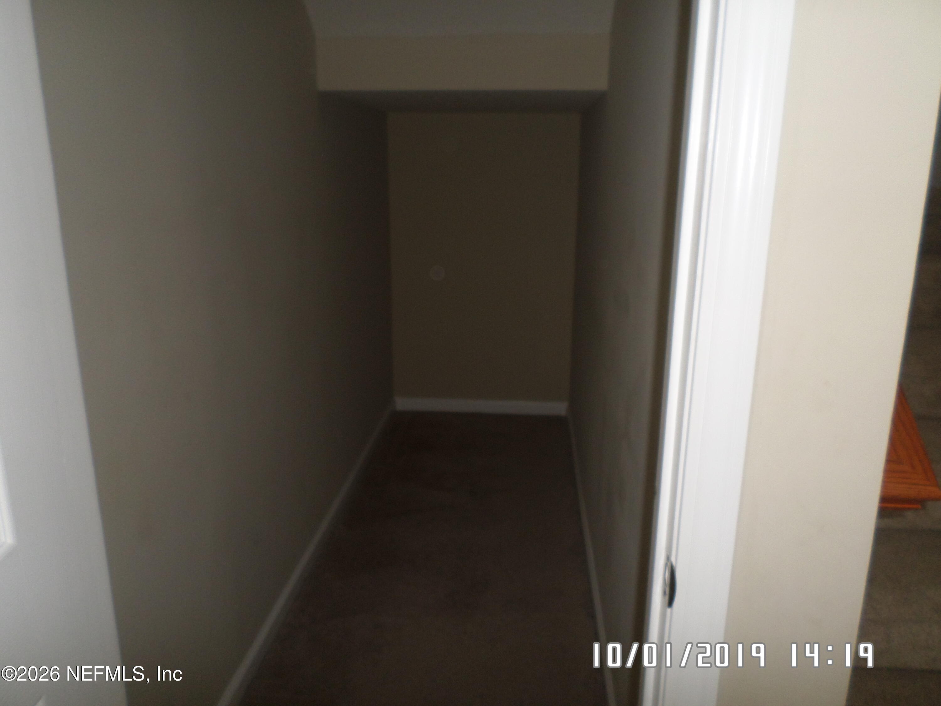 11807 Templeton Road Jacksonville, FL 32258 - Photo 8 of 18 Under stairs storage