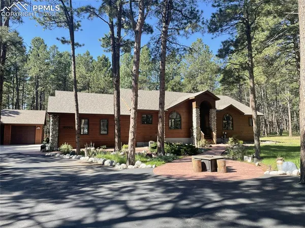 a front view of a house with street view