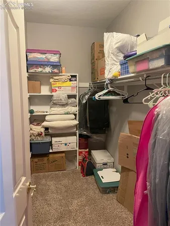 a room with storage and utility