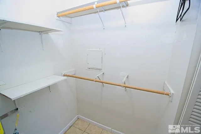 a view of small space with racks on the wall