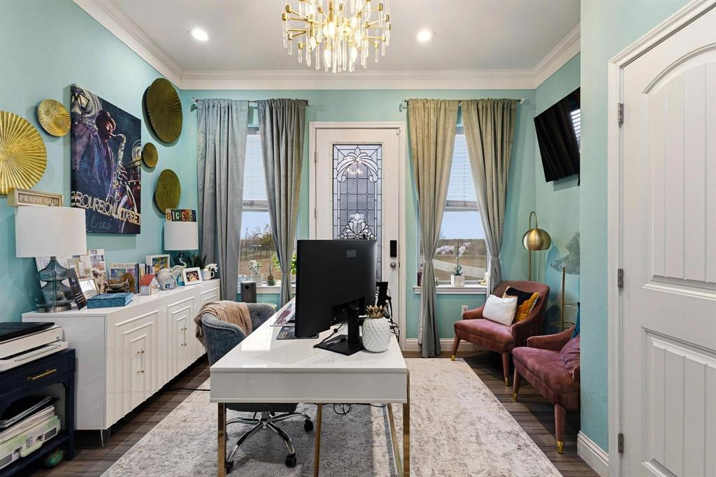 1517 Bennett Road Howe, TX 75459 - Photo 17 of 40 Home office with plenty of natural light, hanging lights, dark wood-style flooring, and ornamental molding