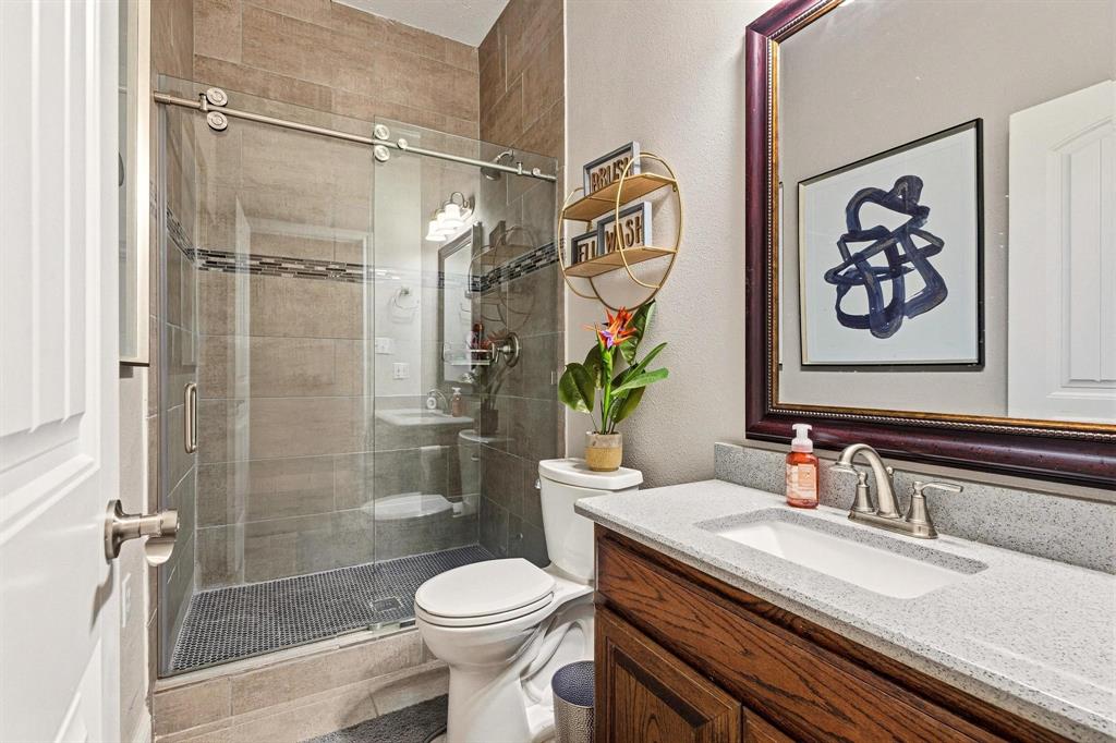 1517 Bennett Road Howe, TX 75459 - Photo 23 of 40 Bathroom featuring vanity and a shower stall