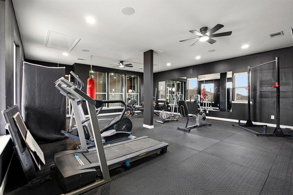 1517 Bennett Road Howe, TX 75459 - Photo 30 of 40 Gym with a ceiling fan and recessed lighting