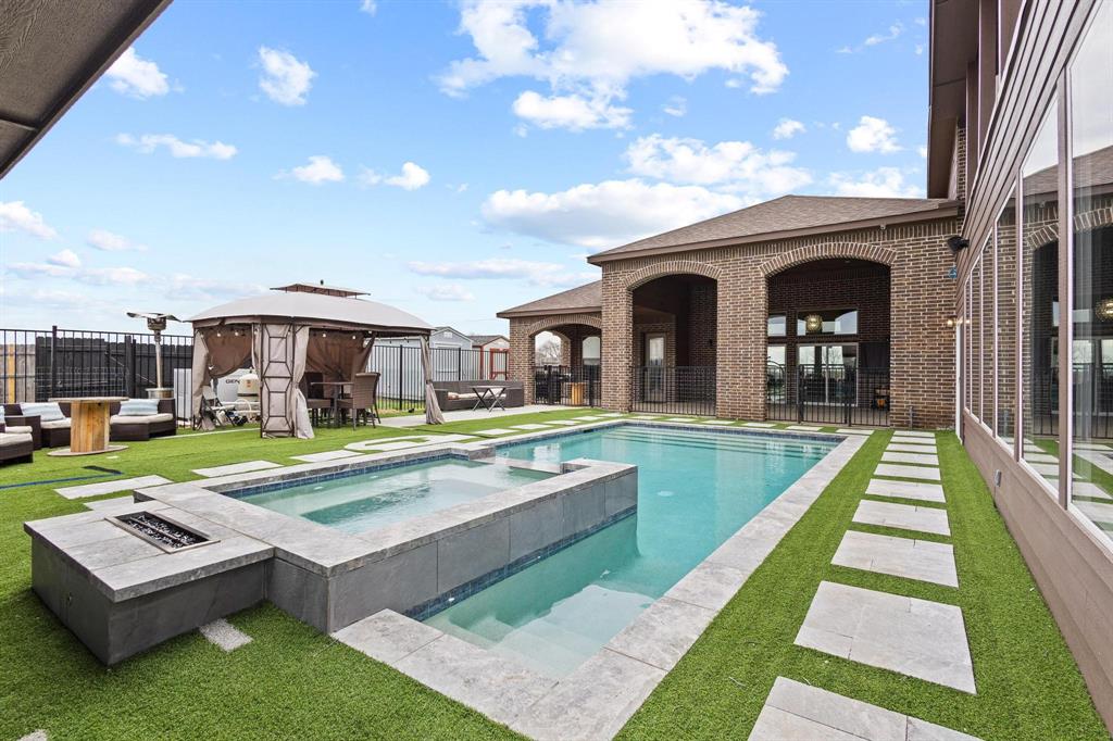 1517 Bennett Road Howe, TX 75459 - Photo 31 of 40 Integrated pool / spa featuring a patio area, a gazebo, and an outdoor fire pit