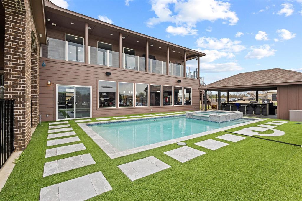 1517 Bennett Road Howe, TX 75459 - Photo 32 of 40 Relaxing pool / spa featuring a balcony, a yard, and a patio area