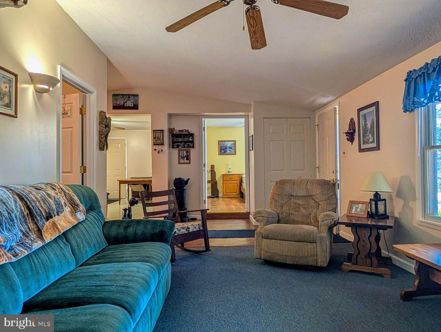 939 Collins Road Artemas, PA 17211 - Photo 17 of 43 a living room with furniture and a couch