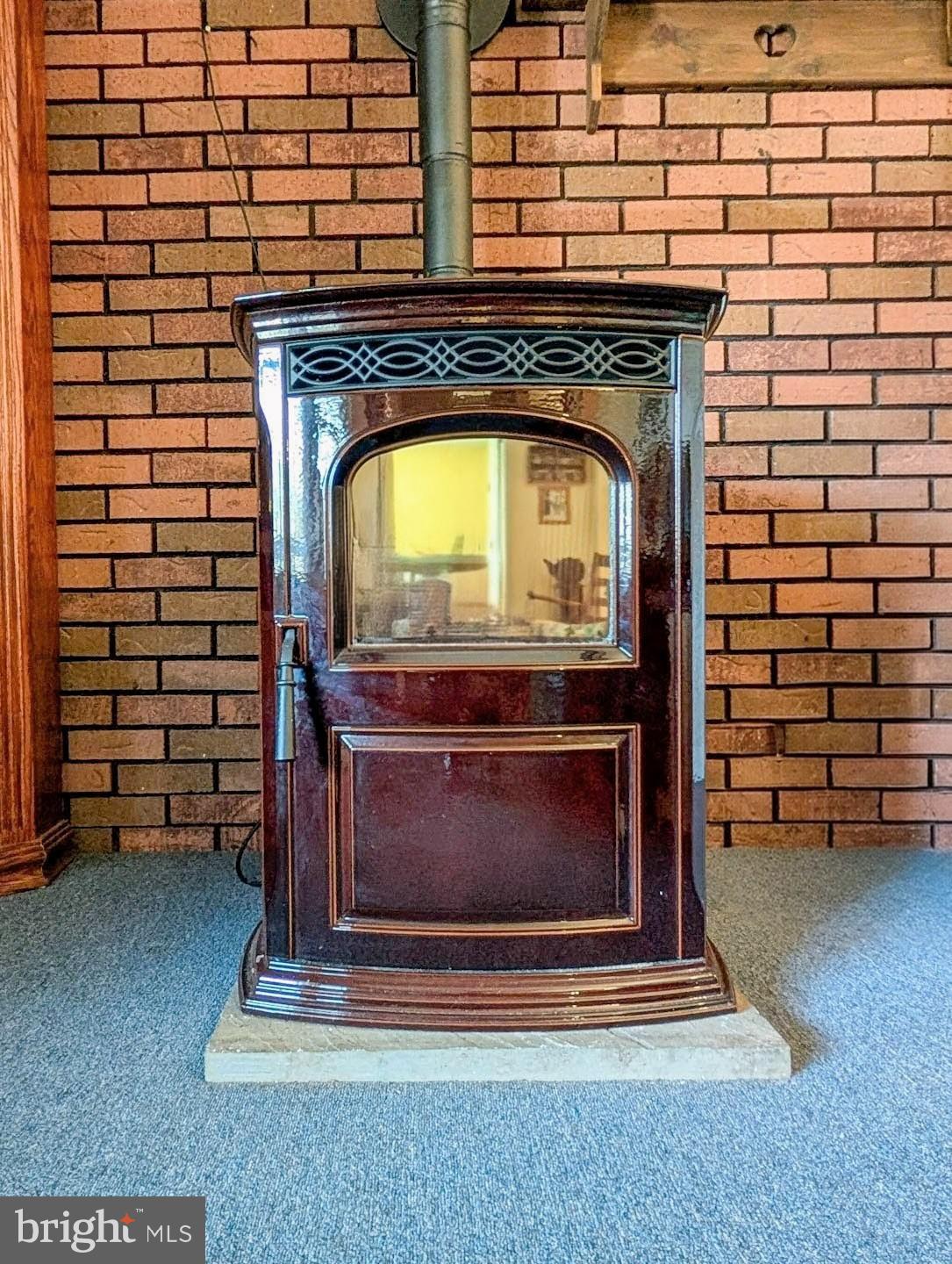 939 Collins Road Artemas, PA 17211 - Photo 18 of 43 a kitchen with a stove and a microwave
