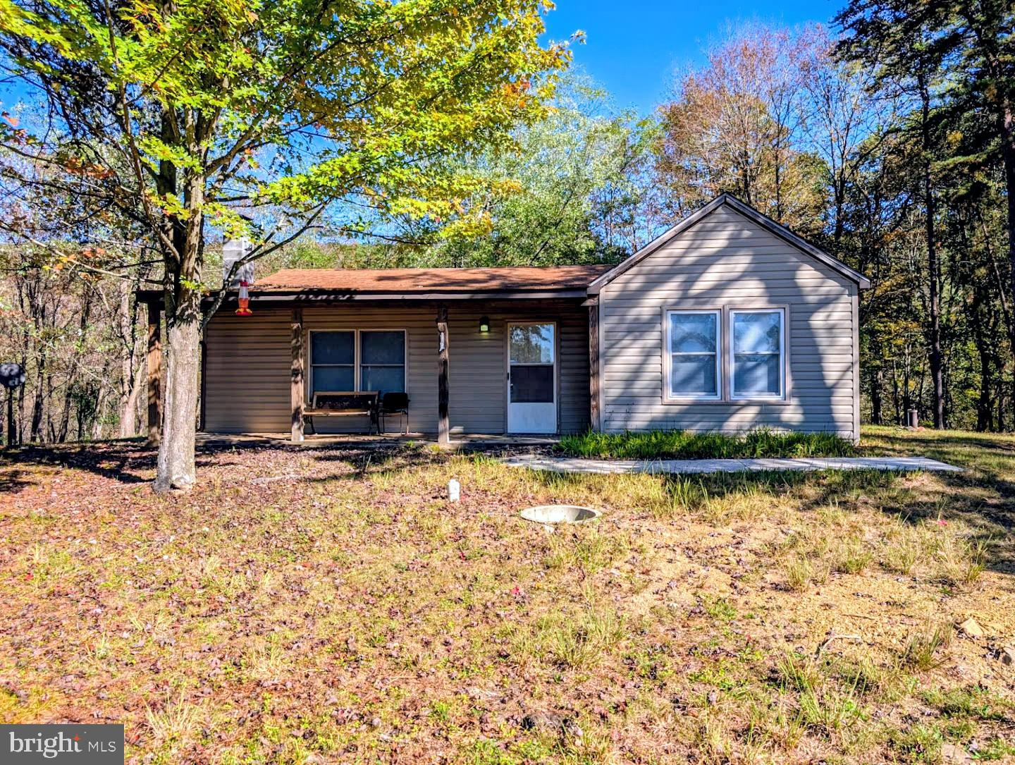 939 Collins Road Artemas, PA 17211 - Photo 2 of 43 a front view of a house with a yard
