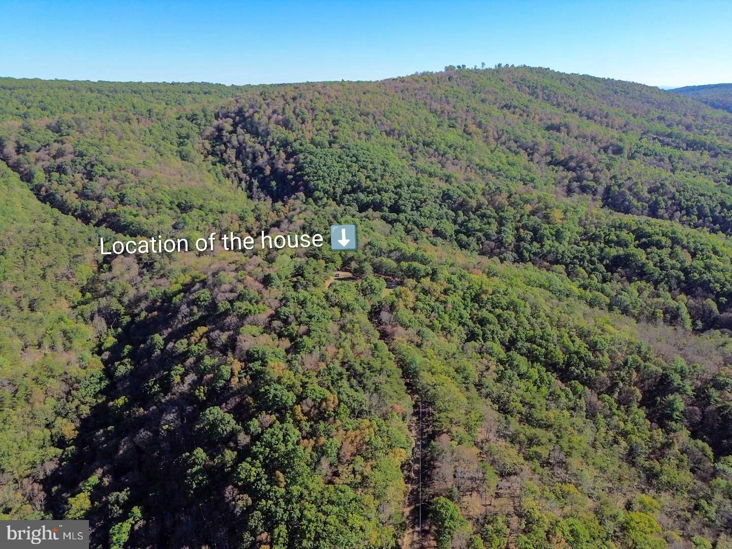 939 Collins Road Artemas, PA 17211 - Photo 4 of 43 a view of a mountain in the distance in a field