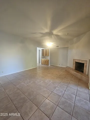 a view of an empty room and window
