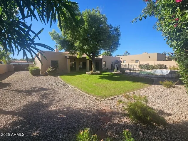 a view of a backyard with a garden