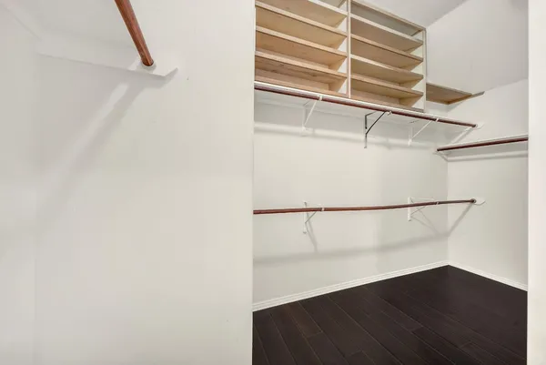 a view of an empty walk in closet
