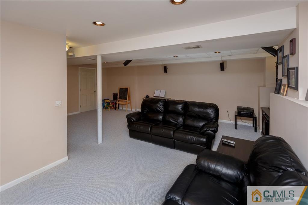 175 Salem Road North Brunswick, NJ 08902 - Photo 17 of 23 a living room with furniture and a couch