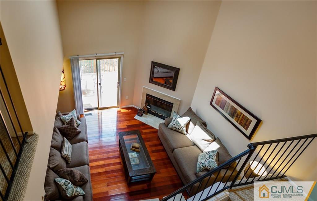 175 Salem Road North Brunswick, NJ 08902 - Photo 7 of 23 a living room with furniture and a flat screen tv