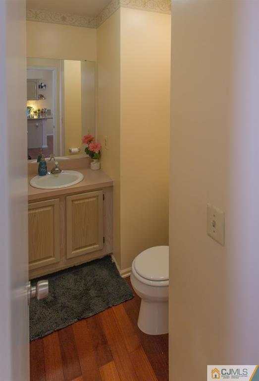 175 Salem Road North Brunswick, NJ 08902 - Photo 8 of 23 a bathroom with a sink and a toilet