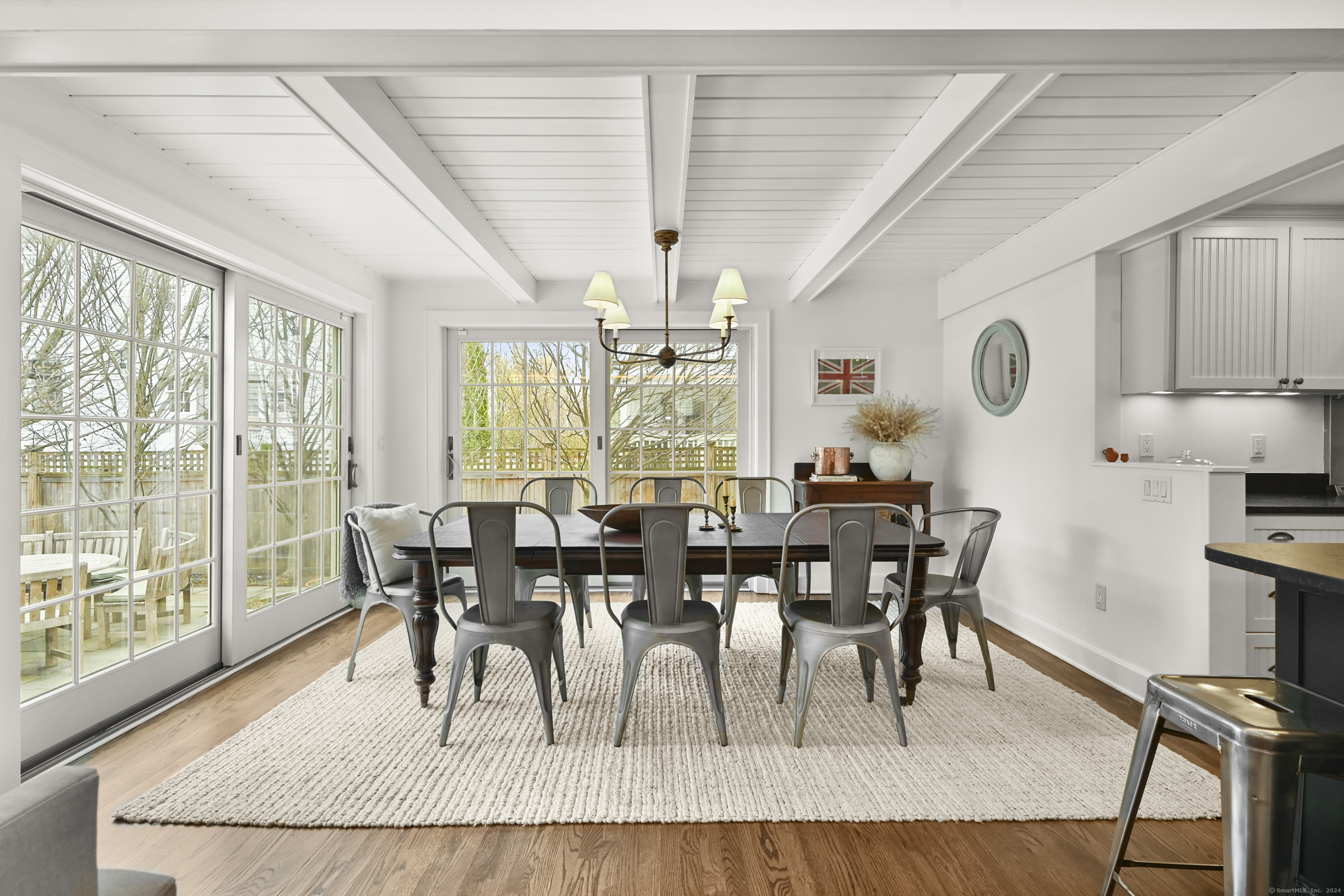 104 Roton Avenue Norwalk, CT 06853 - Photo 12 of 40 a view of a dining room with furniture window and outside view