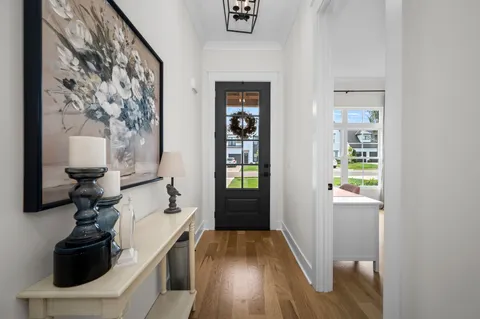 a view of entryway with wooden floor