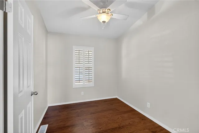 a kitchen with stainless steel appliances granite countertop a refrigerator stove and sink