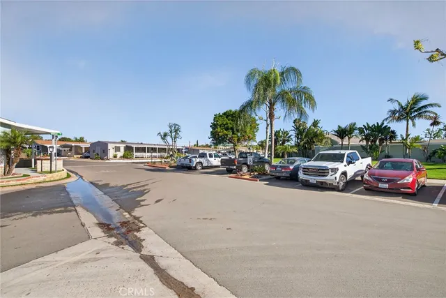 a view of a park with houses
