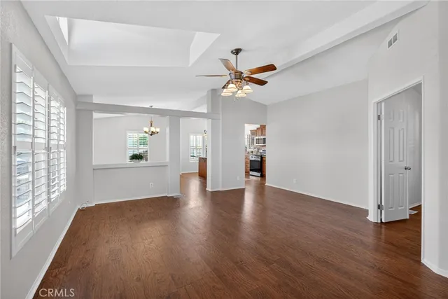 a view of a kitchen cabinets and wooden floor