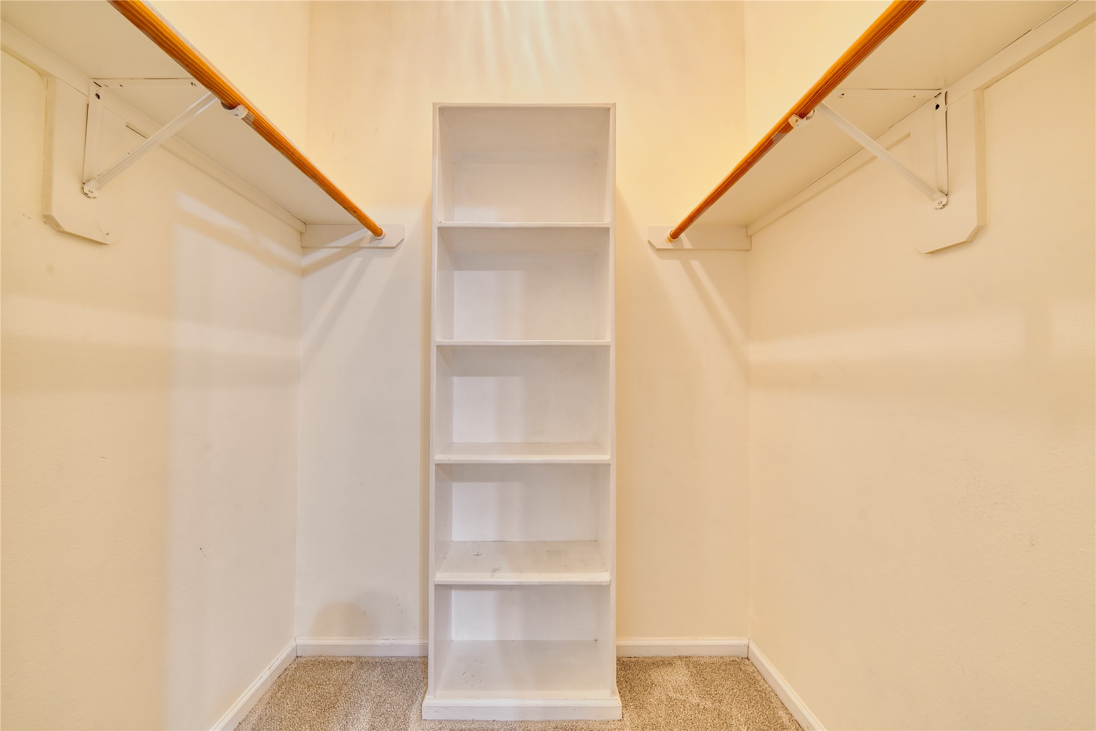 770 Hunt Road, Unit 314 Baytown, TX 77521 - Photo 23 of 26 a view of walk in closet with empty racks