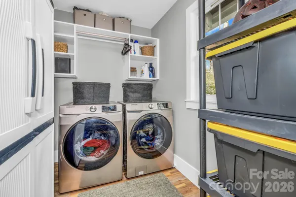a utility room with dryer and washer