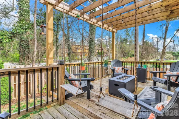 a view of balcony with couch and wooden floor