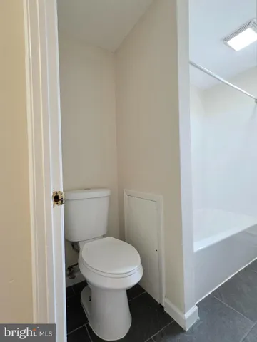 a bathroom with a sink a bathtub and a shower