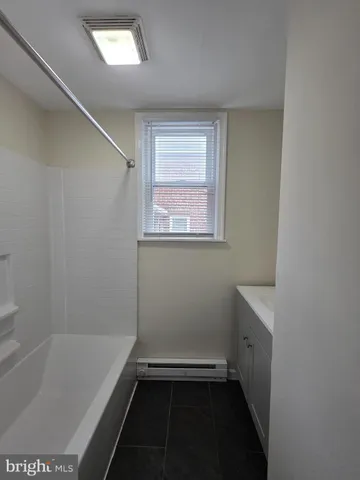 a bathroom with a bathtub