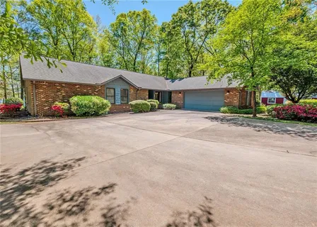 a view of a garden with an outdoor space
