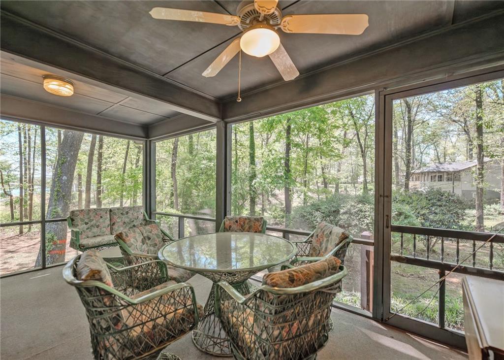 7 Old Oak Trail Hartwell, GA 30643 - Photo 17 of 59 a living room with furniture and a large window