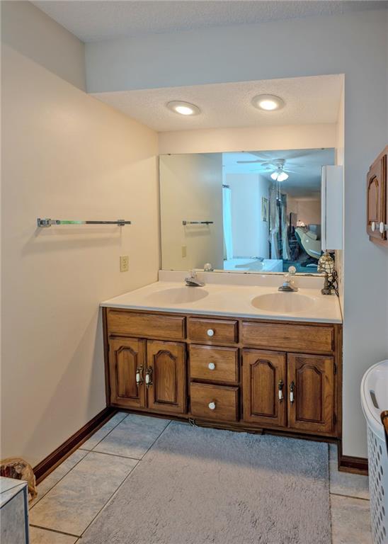 7 Old Oak Trail Hartwell, GA 30643 - Photo 29 of 59 a bathroom with a double vanity sink and a mirror