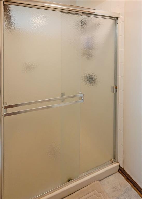 7 Old Oak Trail Hartwell, GA 30643 - Photo 30 of 59 a bathroom with a shower