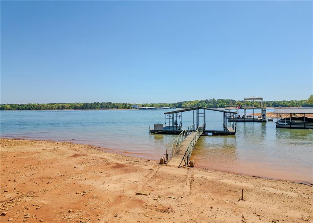 7 Old Oak Trail Hartwell, GA 30643 - Photo 34 of 59 a view of a lake with houses