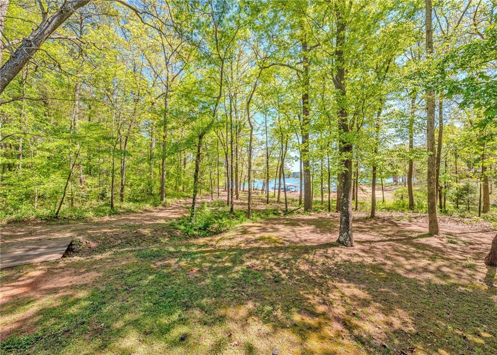 7 Old Oak Trail Hartwell, GA 30643 - Photo 47 of 59 a house with trees in front of it