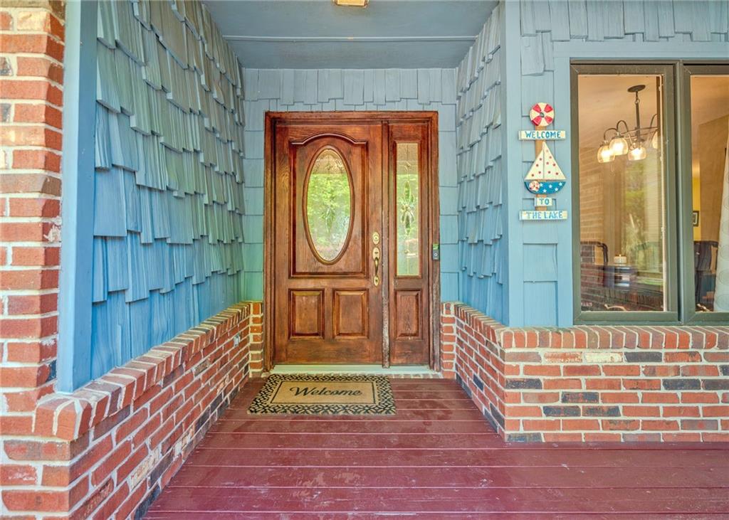 7 Old Oak Trail Hartwell, GA 30643 - Photo 7 of 59 a view of a entryway door with wooden floor