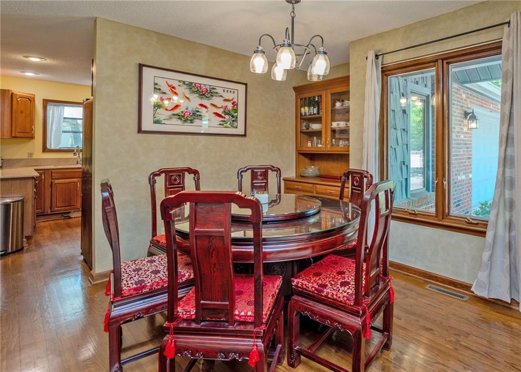 7 Old Oak Trail Hartwell, GA 30643 - Photo 9 of 59 a view of a dining room with furniture window and wooden floor