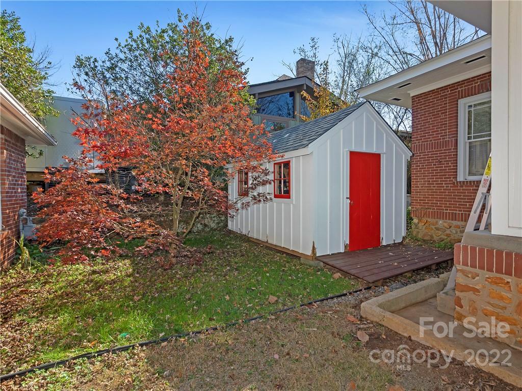 218 West Main Street Brevard, NC 28712 - Photo 45 of 48 a front view of a house with a yard