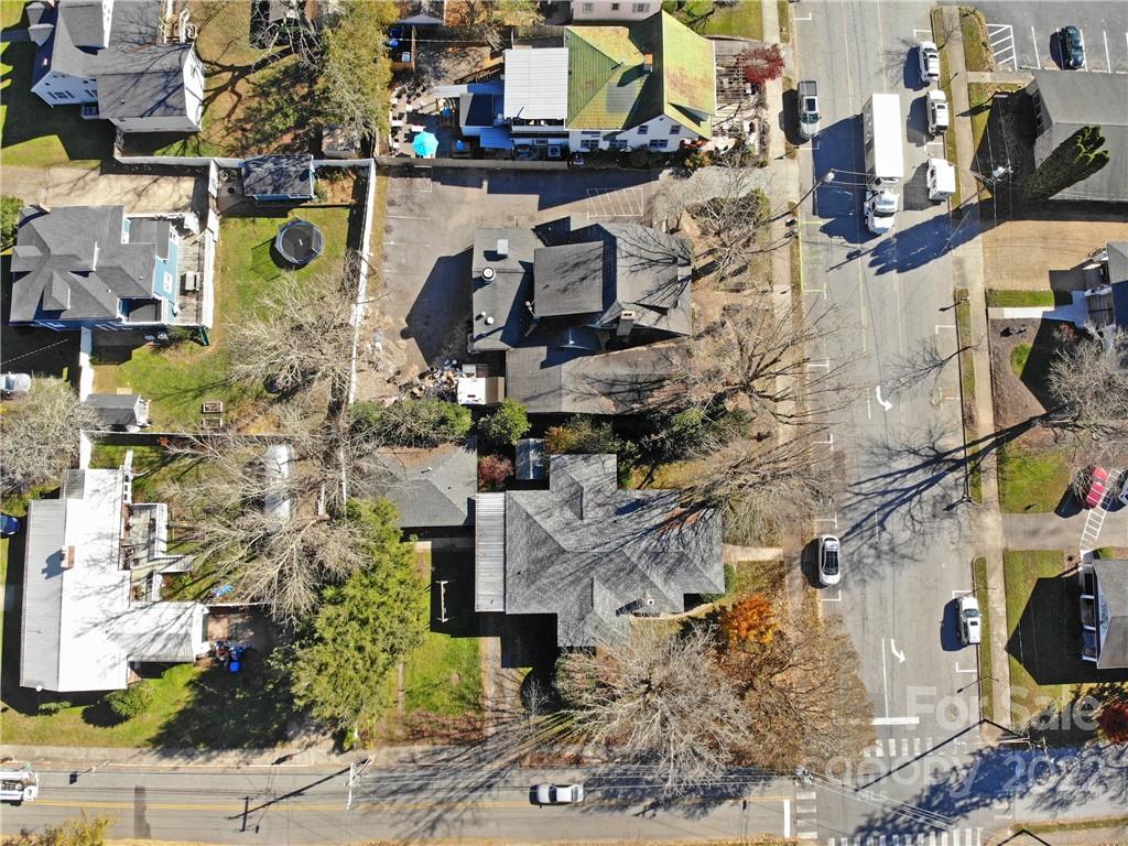 218 West Main Street Brevard, NC 28712 - Photo 46 of 48 an aerial view of multiple houses with outdoor space