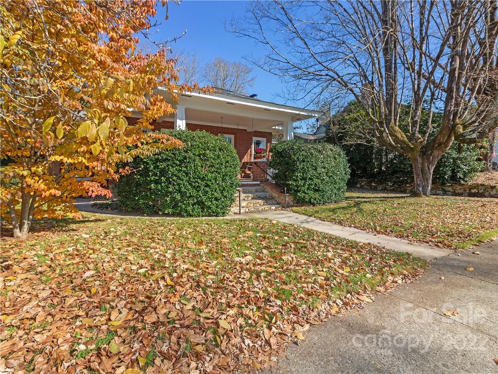 218 West Main Street Brevard, NC 28712 - Photo 5 of 48 front view of a house with a yard