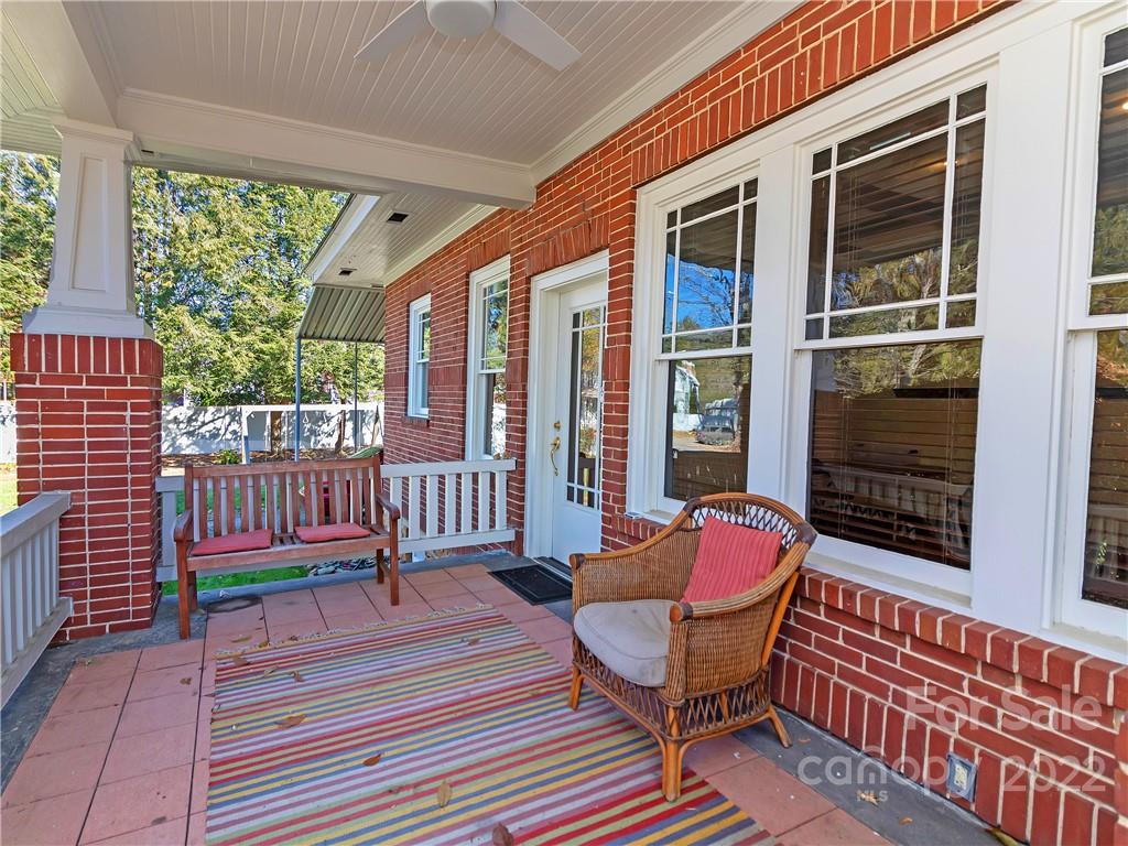 218 West Main Street Brevard, NC 28712 - Photo 9 of 48 a view of a deck with wooden floor and outdoor space