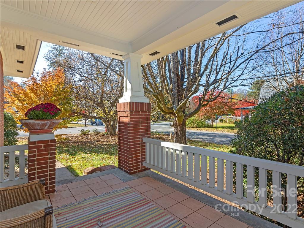 218 West Main Street Brevard, NC 28712 - Photo 10 of 48 a view of a porch with a yard