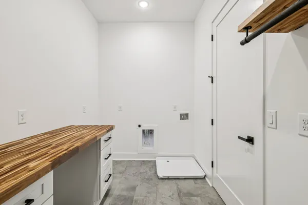 a view of walk in closet with cabinet