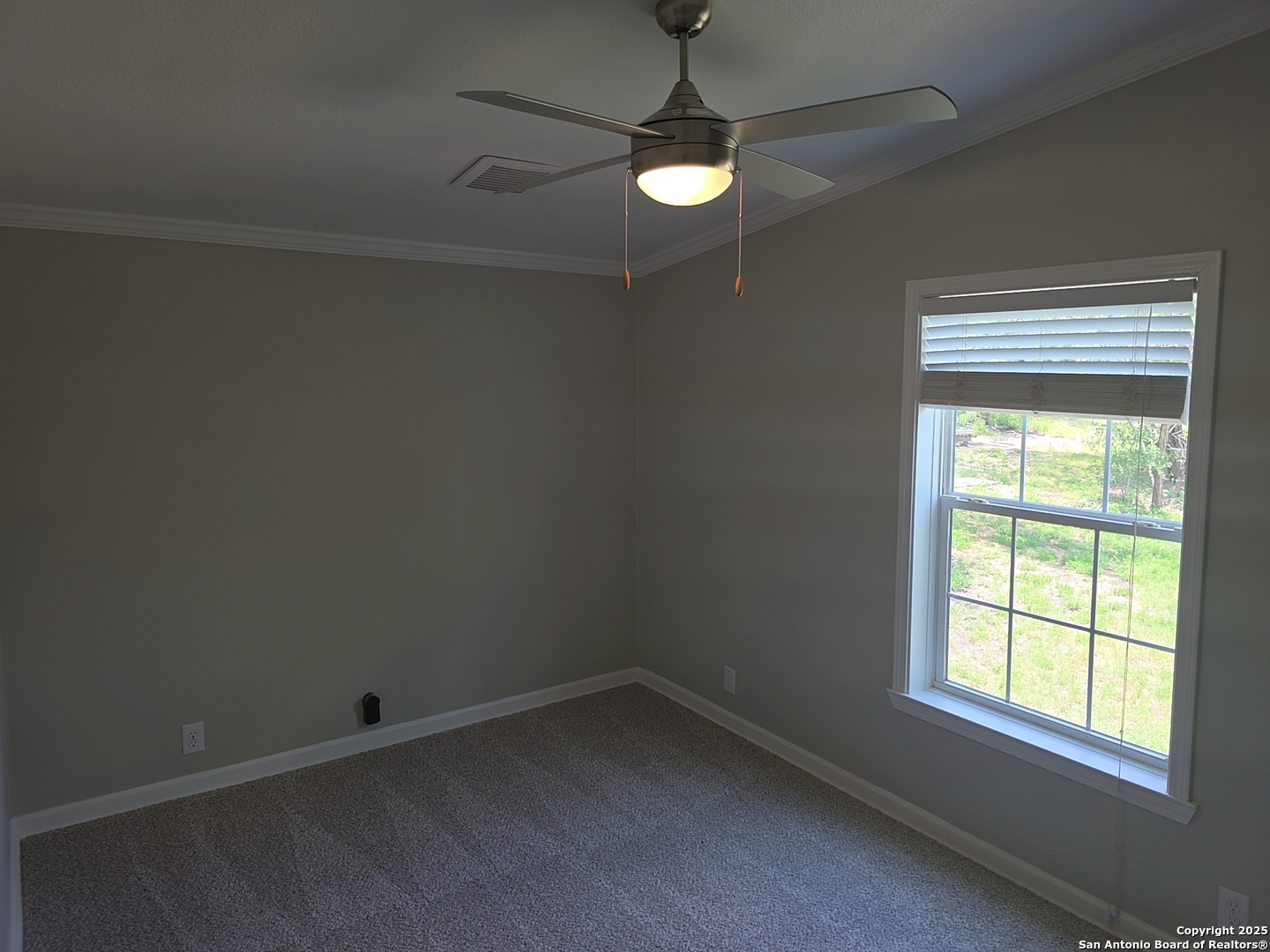7940 County Road 279 Rio Medina, TX 78066 - Photo 22 of 33 an empty room with a window