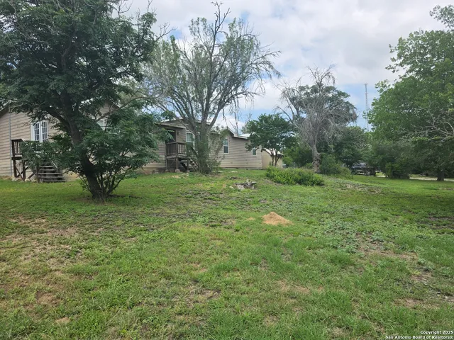 a view of a backyard with a garden