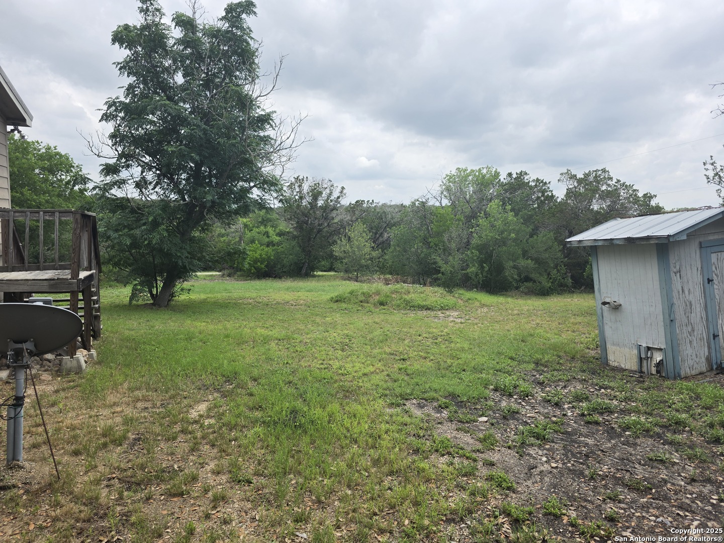 7940 County Road 279 Rio Medina, TX 78066 - Photo 30 of 33 a view of a backyard with a garden