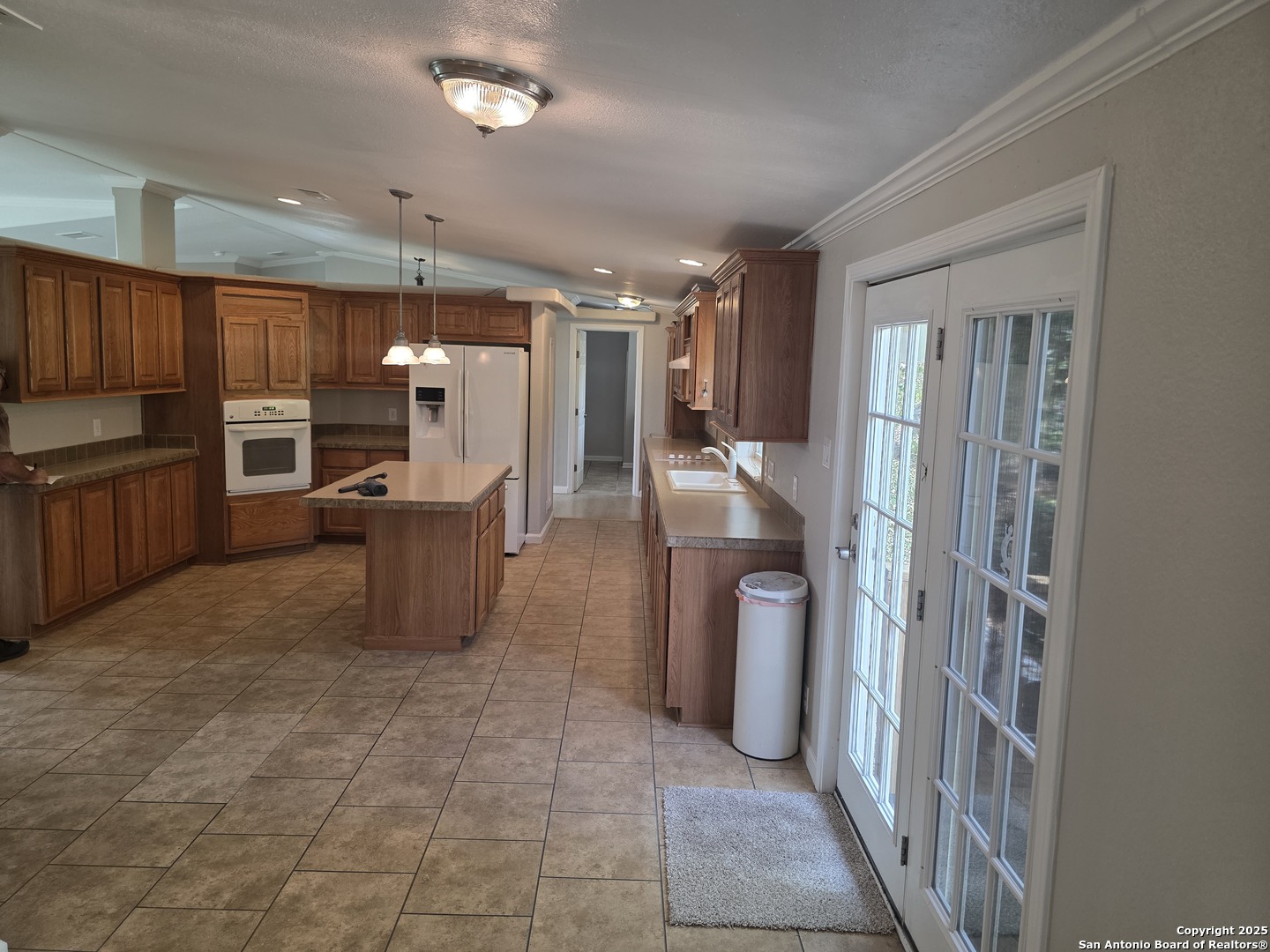 7940 County Road 279 Rio Medina, TX 78066 - Photo 3 of 33 a view of a kitchen with furniture and windows