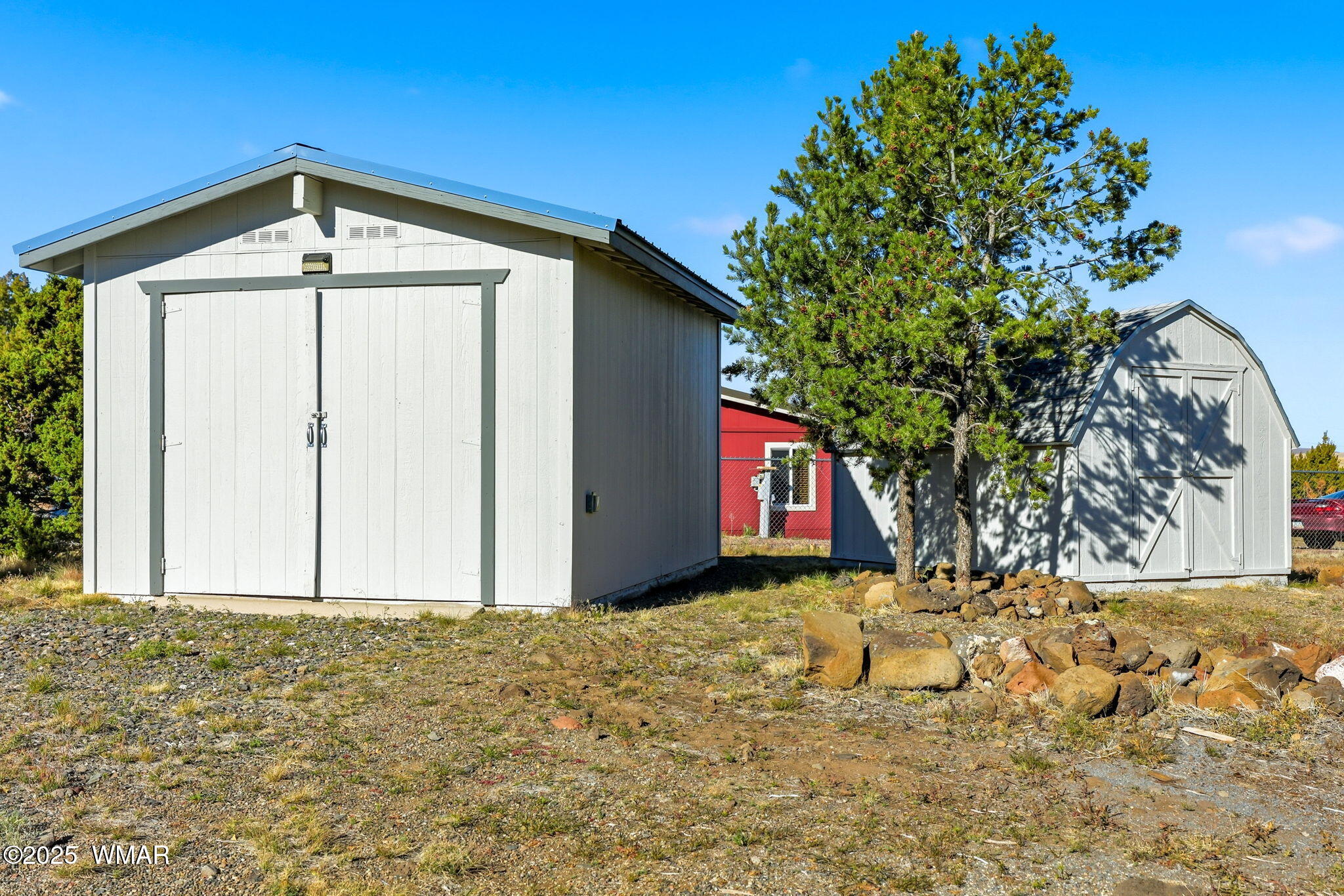 1535 Cheetah Way Eagar, AZ 85925 - Photo 24 of 34 Utility Buildings-Large Shed on Left is Insulated Inside