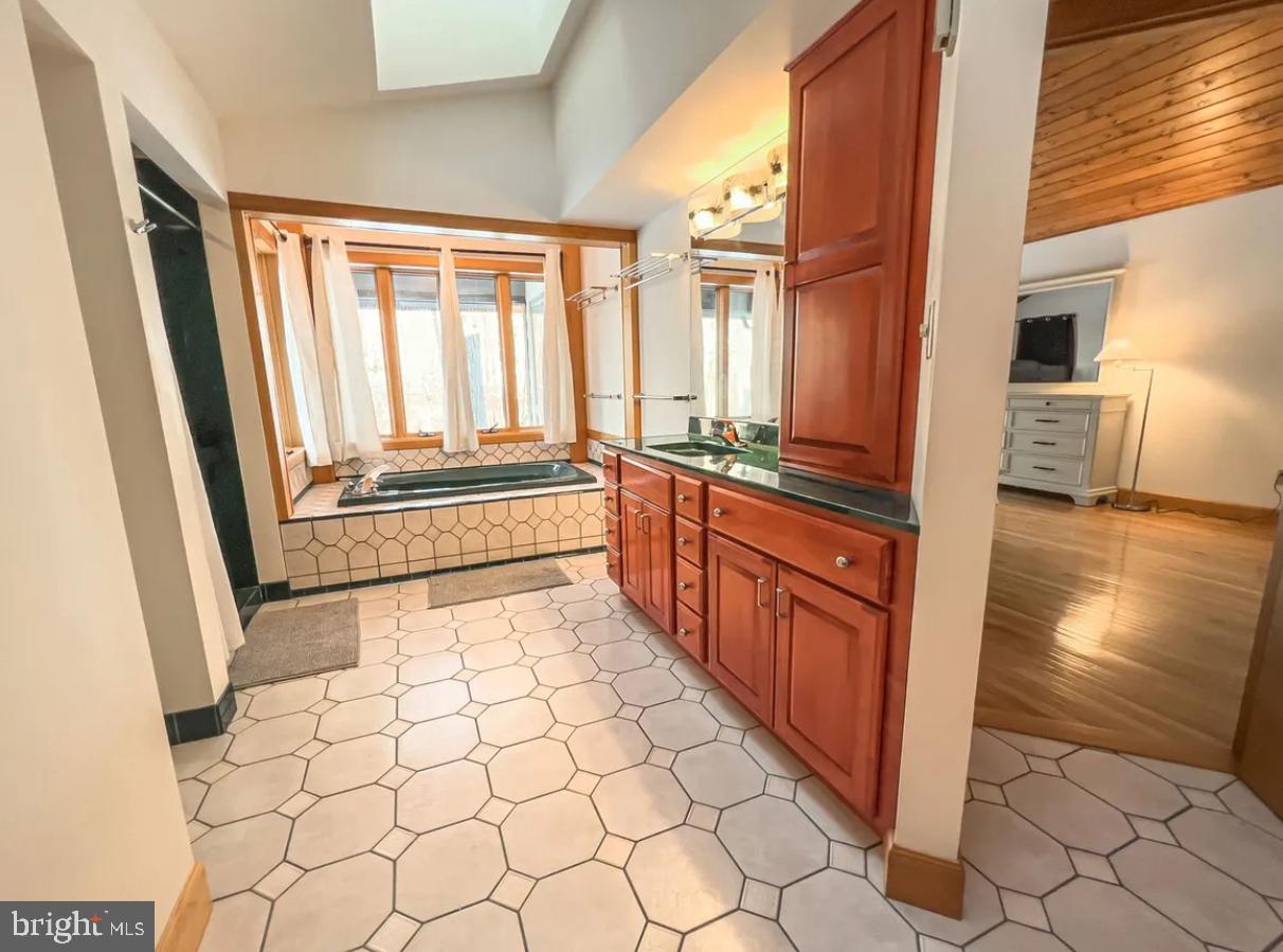 349 Lucas Road Warfordsburg, PA 17267 - Photo 23 of 59 a kitchen with stainless steel appliances a sink and a refrigerator